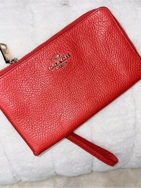 Coach orange Pebbled Leather Wristlet Clutch